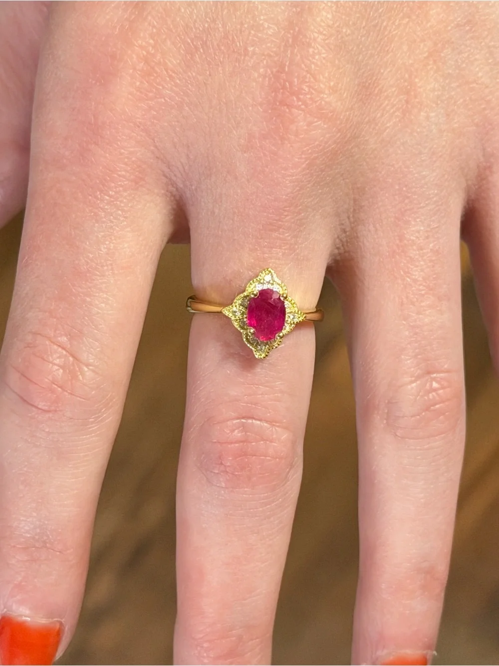 Stunning Natural 7x5mm Oval Ruby Zircon  accent in 14K Yellow GP Ring Size 6
